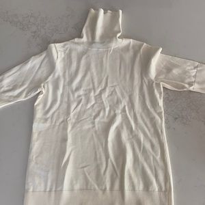 Brand new white short sleeved turtleneck